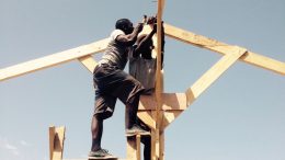 Haitian youth erect the frame for a hempcrete building project near Port au Prince